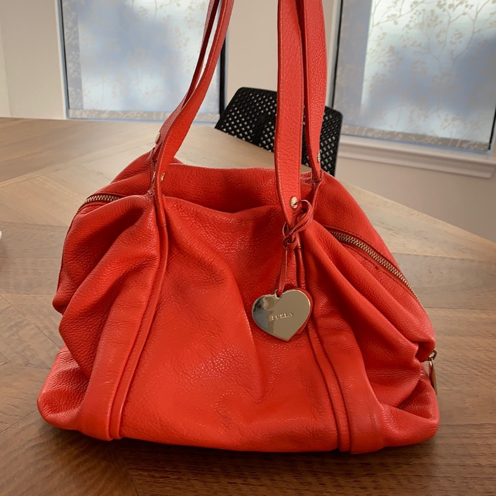 Furla purse in burnt orange color